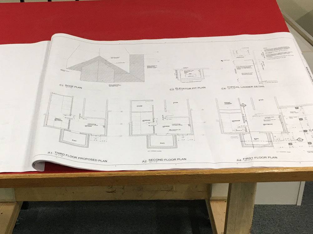 house blueprint drawings on a table