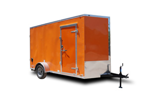 smaller orange single axel utility trailer